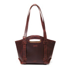 Original Tote in Chestnut, front view showing cutout handle and buckled shoulder straps