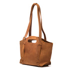 Original Tote in Tobacco, angled front view with cutout handle and buckled shoulder straps