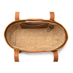 Original Tote in Tobacco, top-down view of empty canvas-lined interior with slip pocket and key clip