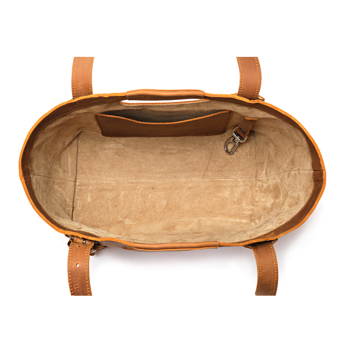 Original Tote in Tobacco, top-down view of empty canvas-lined interior with slip pocket and key clip