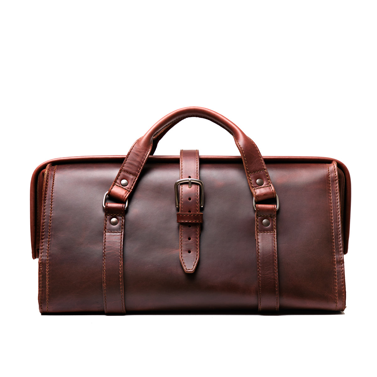 Leather Range and Tool Bag in Chestnut, front view with top handles, center buckle strap and frame opening