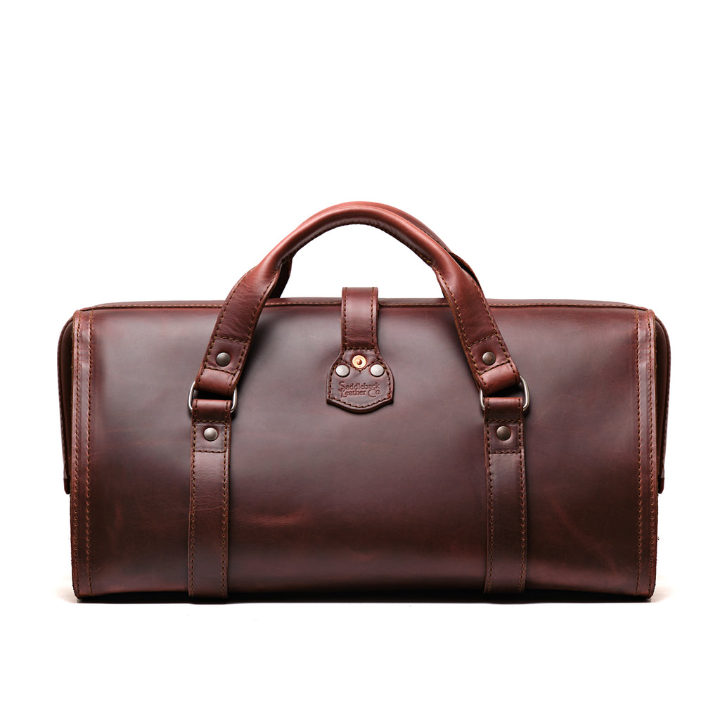 Leather Range and Tool Bag in Chestnut, back view with top handles and riveted strap tab