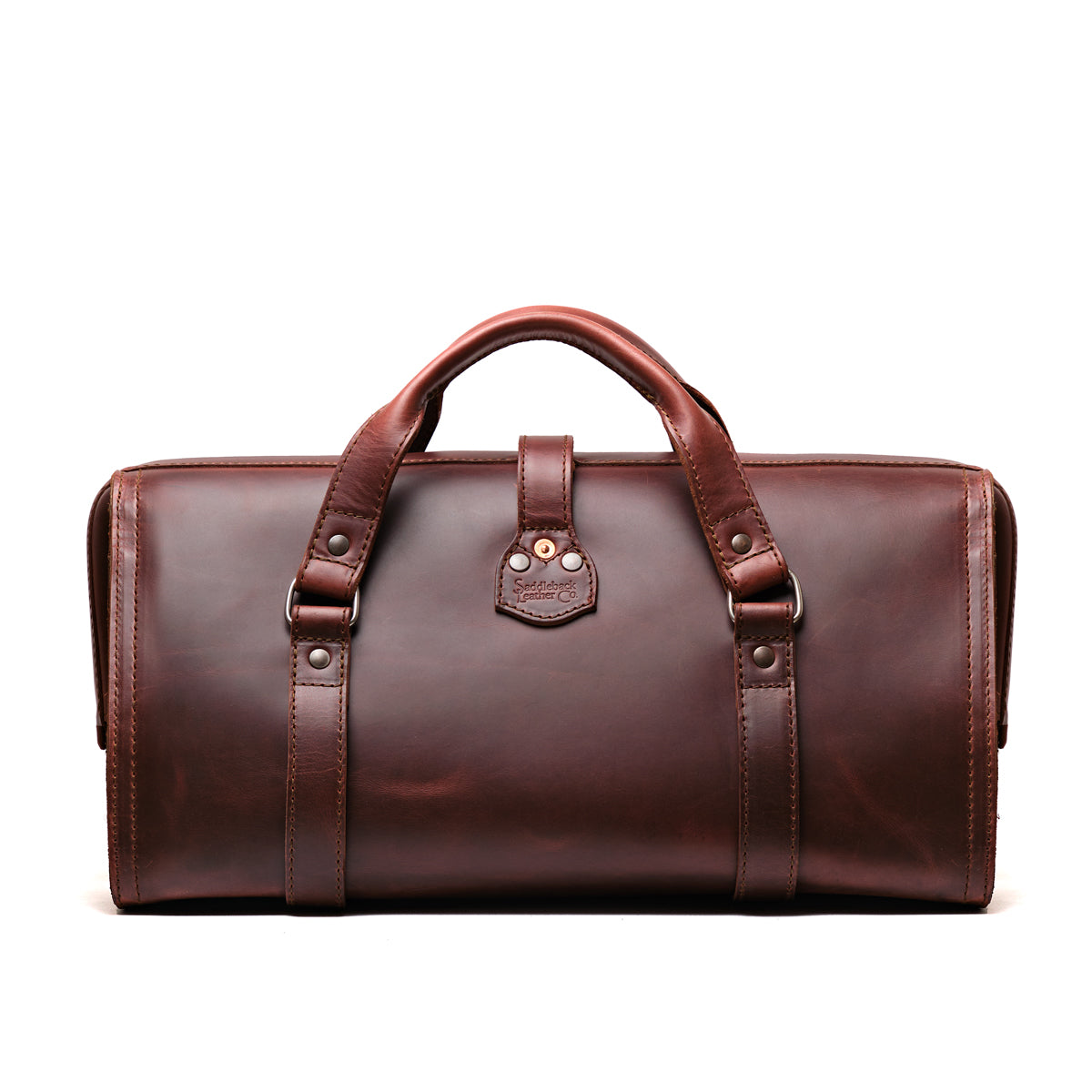 Leather Range and Tool Bag in Chestnut, back view with top handles and riveted strap tab