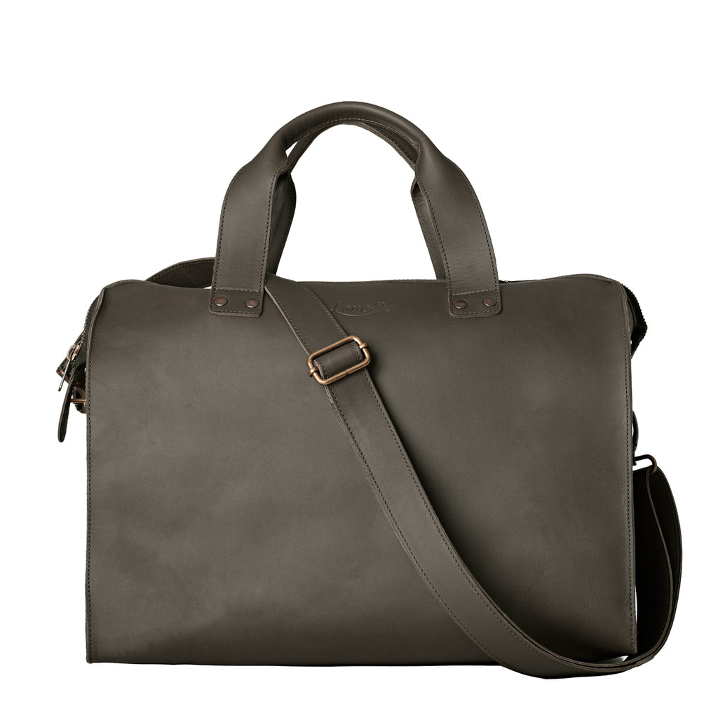 Simple Overnight Leather Duffle Bag in Black, front view with top handles and shoulder strap