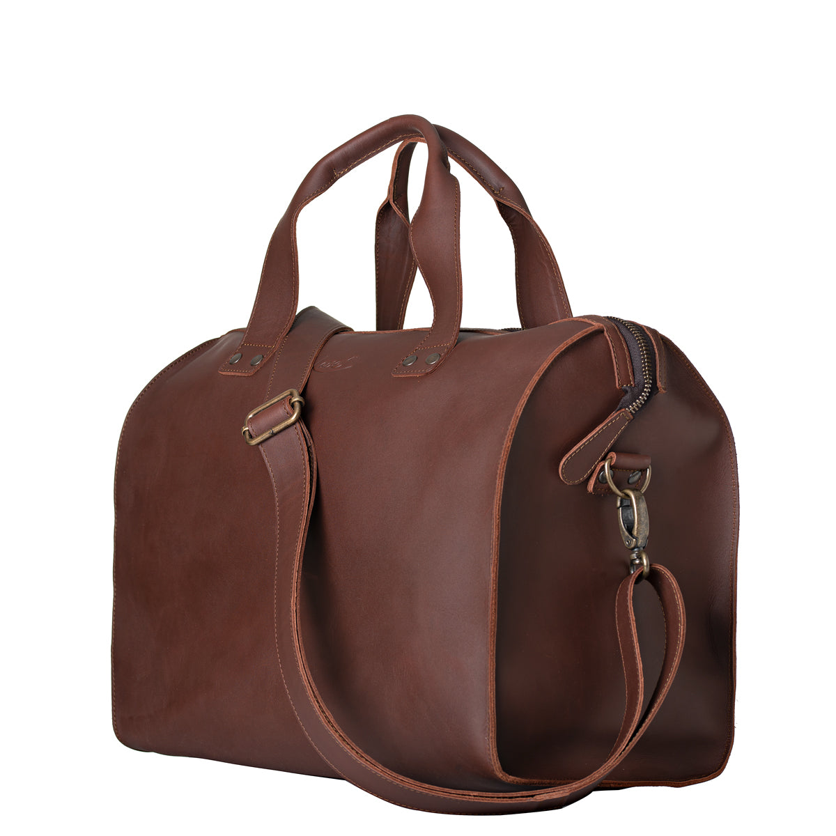 Simple Overnight Leather Duffle Bag in Chestnut, angled side view with shoulder strap clipped on