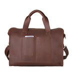 Simple Overnight Leather Duffle Bag in Chestnut, back view with exterior slip pockets holding a phone