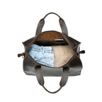 Simple Overnight Leather Duffle Bag in Dark Coffee Brown, open top packed with folded jeans and a sweater