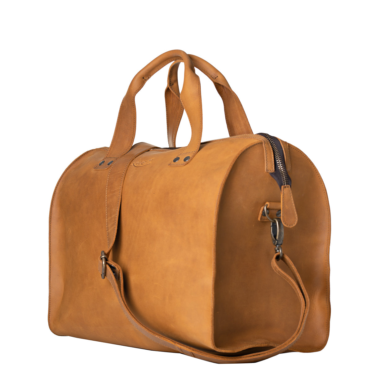 Simple Overnight Leather Duffle Bag in Tobacco, angled side view with shoulder strap clipped on