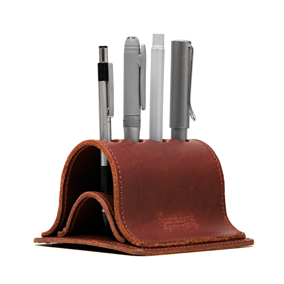 Pen Holder Bell Curve in Chestnut leather, angled front view holding four pens
