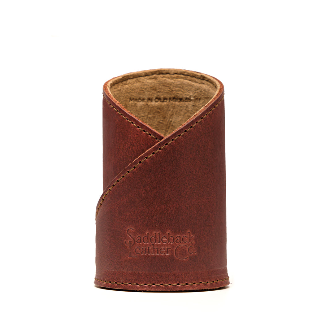 Pen Cup in Chestnut leather, front view with large embossed Saddleback Leather Co. logo and crossed stitched wrap