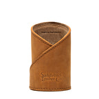 Pen Cup in Tobacco leather, front view with large embossed Saddleback Leather Co. logo and crossed stitched wrap