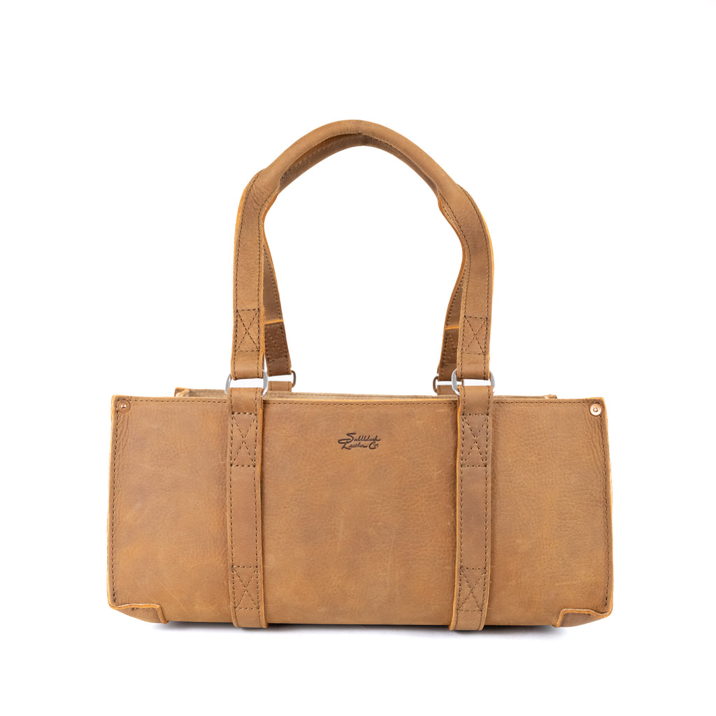 Range and Tool Tote in Tobacco leather with strap-wrapped body and twin handles, front view