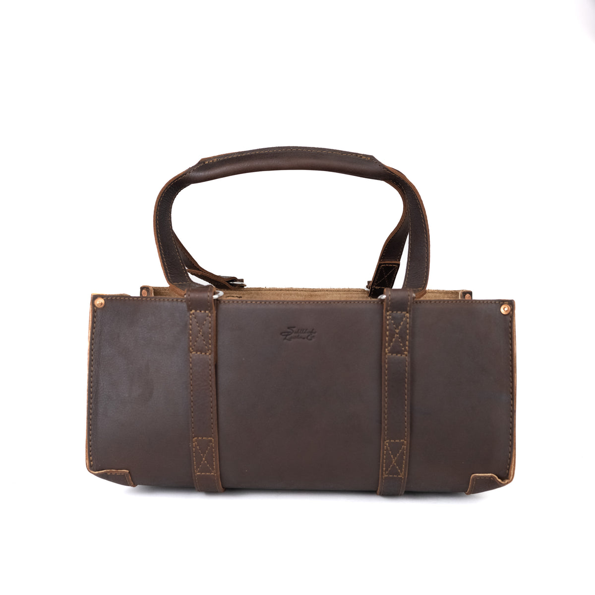 Range and Tool Tote in Dark Coffee Brown leather with strap-wrapped body and twin handles, front view