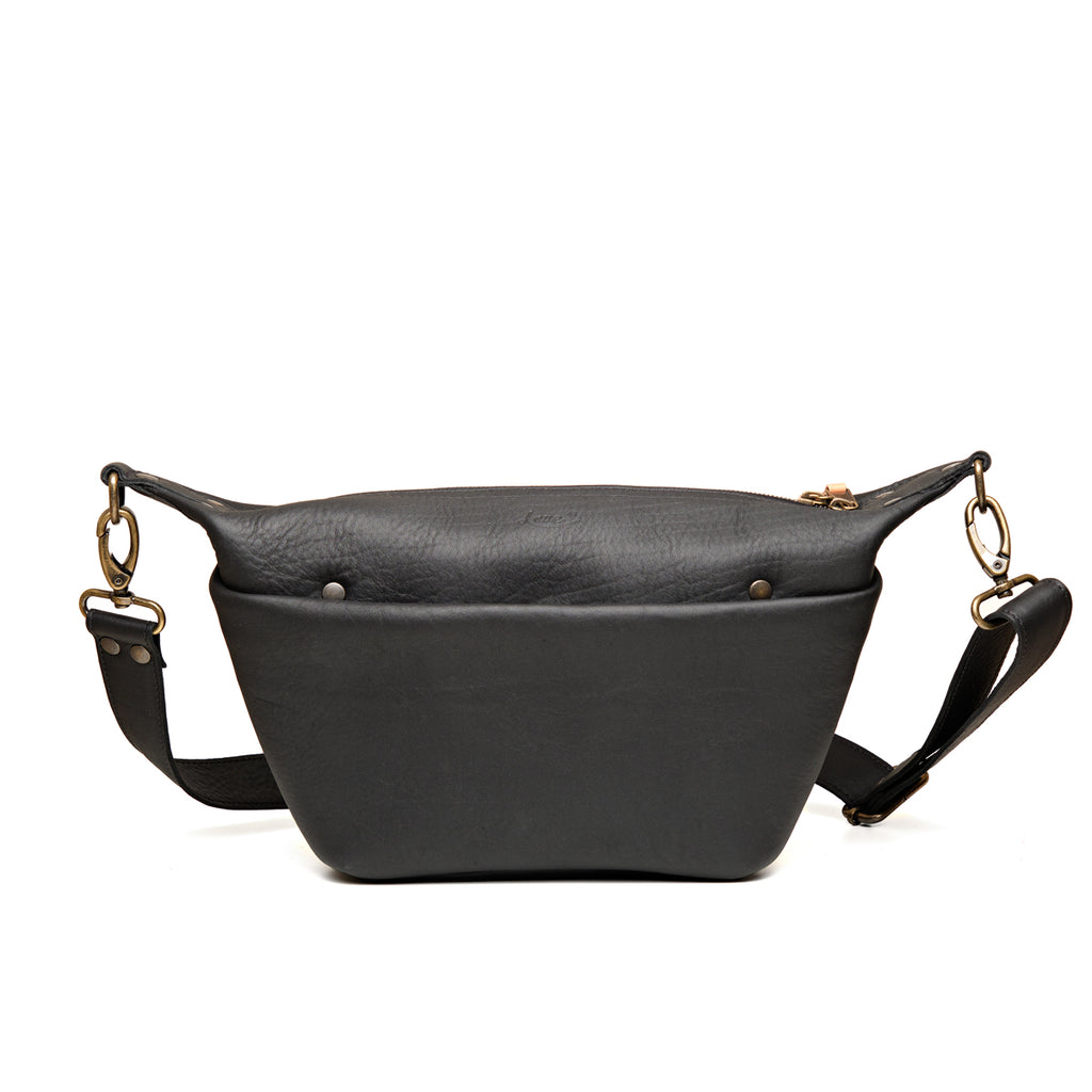 London Sling Small in Black, front view with snap pocket and adjustable strap