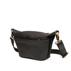 London Sling Small in Black, angled side view showing the front pocket and strap clip