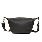 London Sling Small in Black, back view with smooth panel and adjustable strap