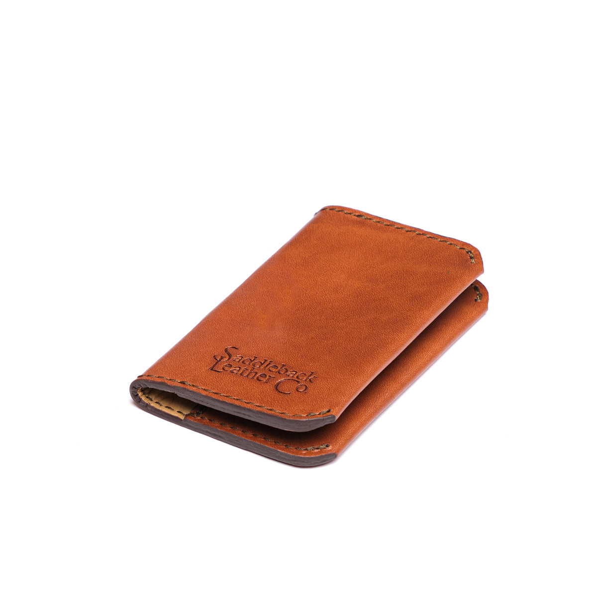 Slim Business Card Holder in English Tan, closed angled view with embossed logo