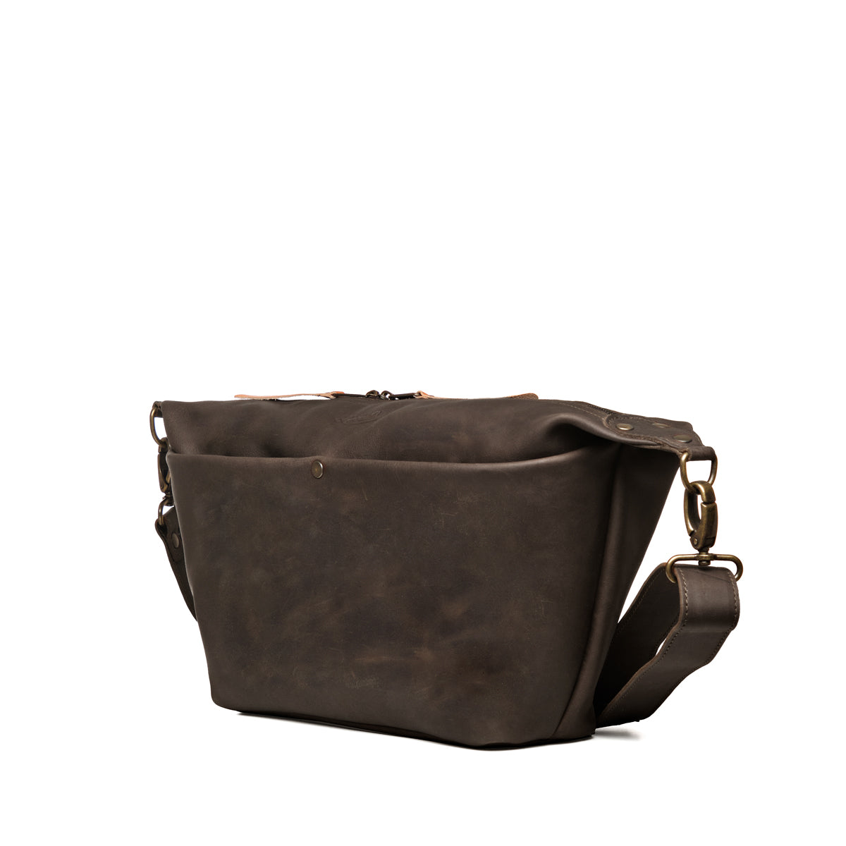 London Sling Large in Black, angled side view showing the front pocket and strap clip