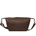 London Sling Large in Dark Coffee Brown, back view with smooth panel and adjustable strap