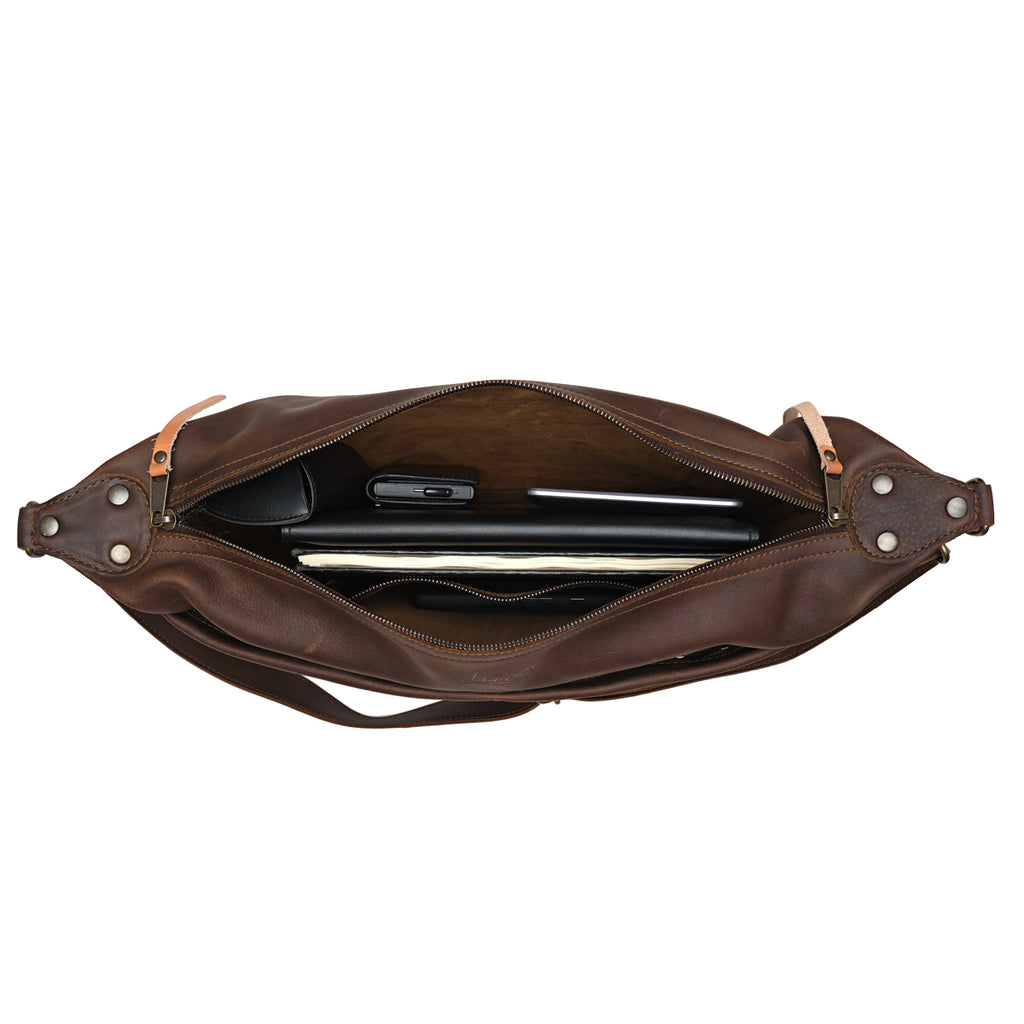 London Sling Large in Dark Coffee Brown, top view unzipped with a tablet, notebook and phone inside