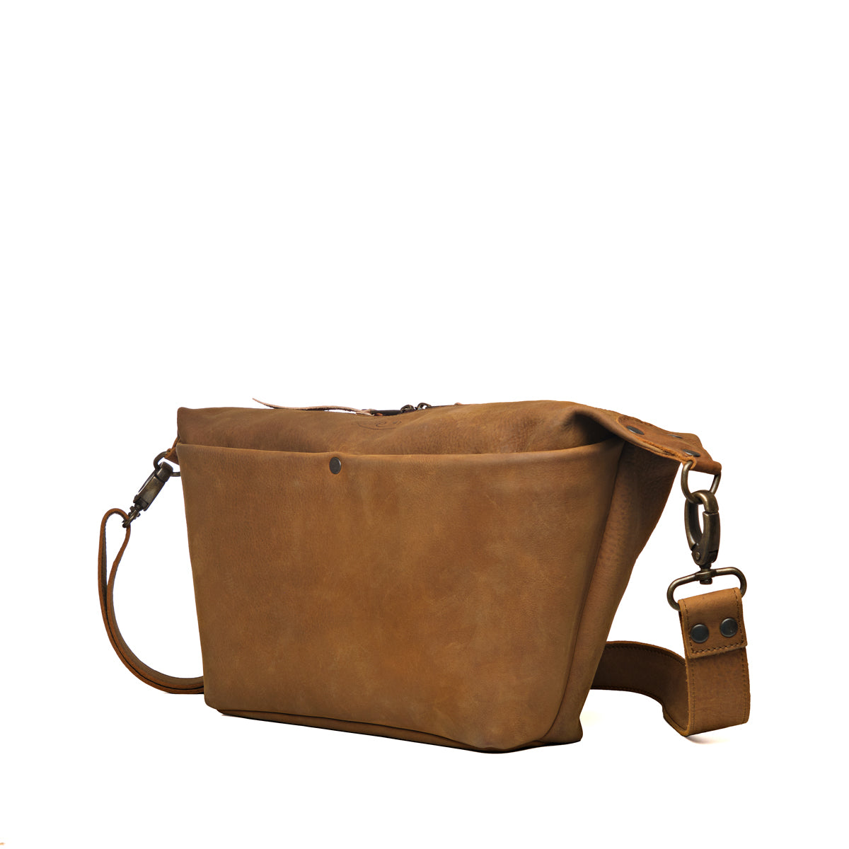 London Sling Large in Tobacco, angled side view showing the front pocket and strap clip