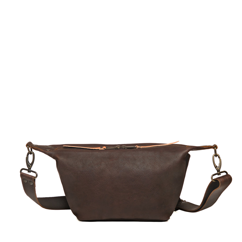 London Sling Small in Dark Coffee Brown, back view with smooth panel and adjustable strap