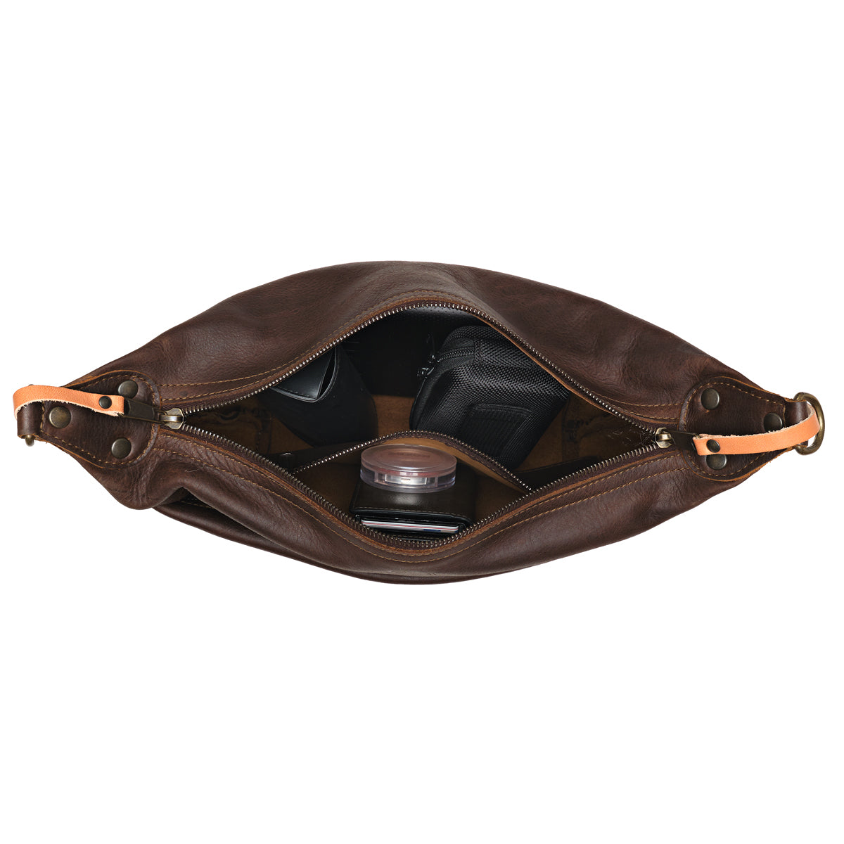 London Sling Small in Dark Coffee Brown, top view unzipped with a camera, lip balm and small pouch inside