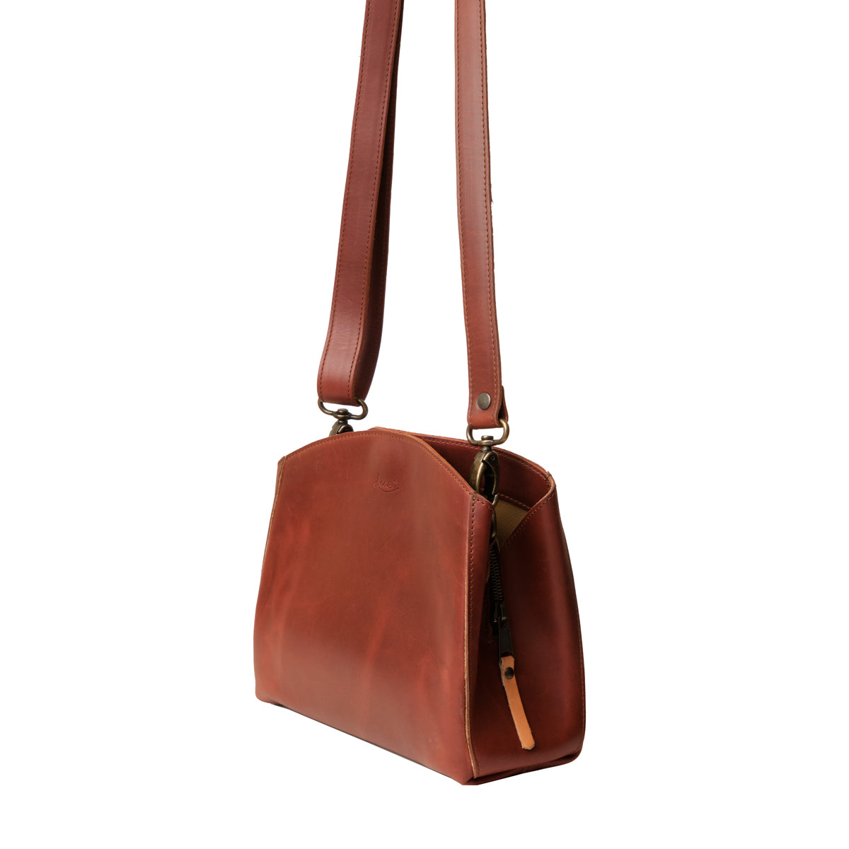 Leather Organizer Crossbody in Chestnut, angled side view showing the side zipper pull