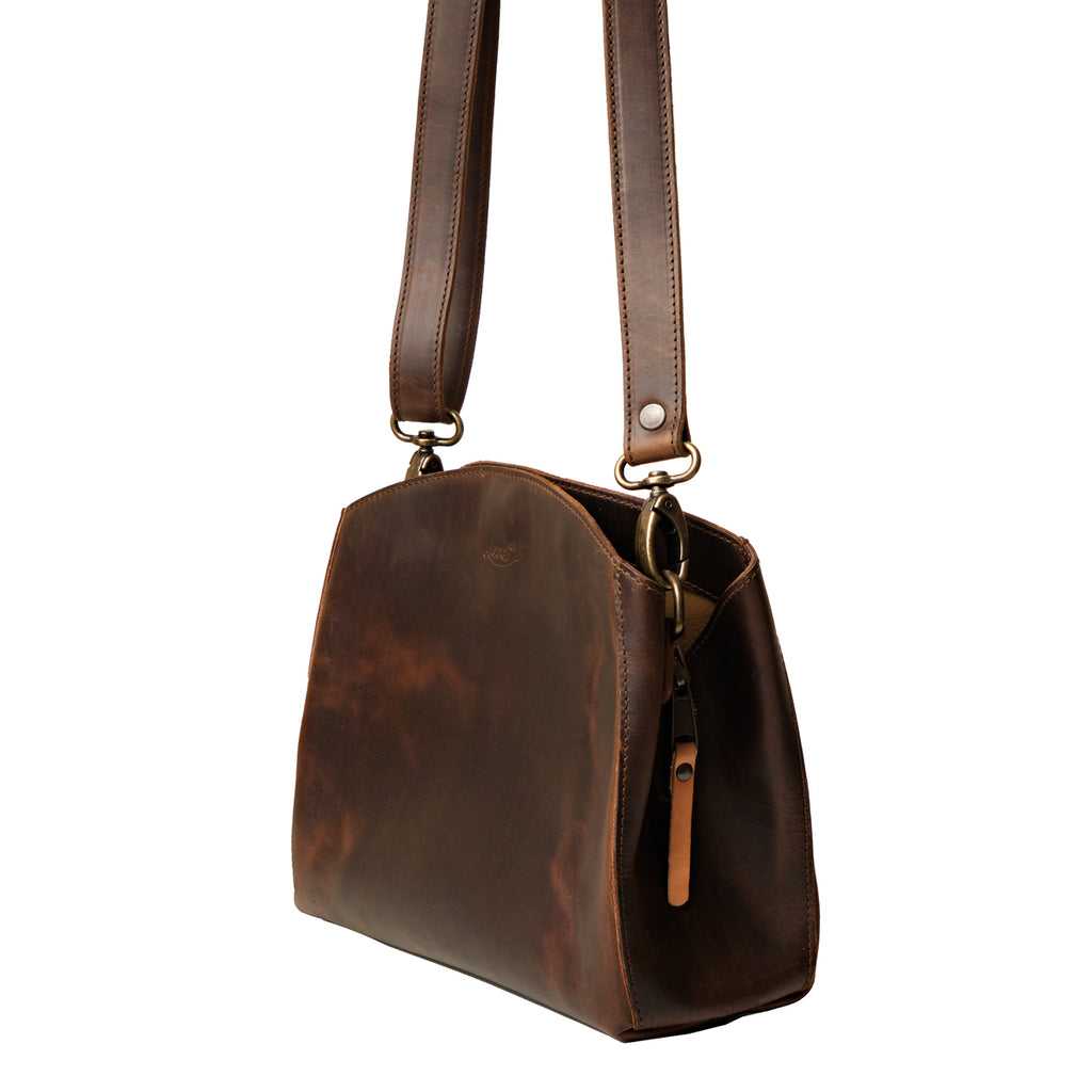 Leather Organizer Crossbody in Dark Coffee Brown, angled side view showing the side zipper pull