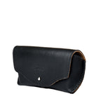 Leather Sunglass Case in Black, closed angled view showing curved flap and snap closure