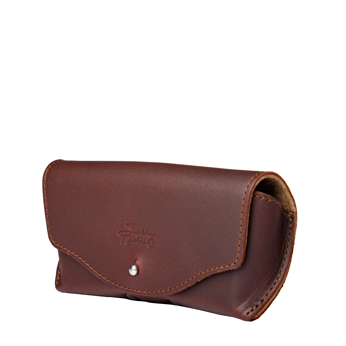 Leather Sunglass Case in Chestnut, closed angled view showing curved flap and snap closure