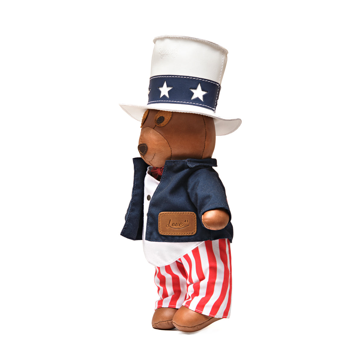 2026 Uncle Sam Teddy Bear, side view in star top hat, navy jacket with leather pocket patch and striped pants