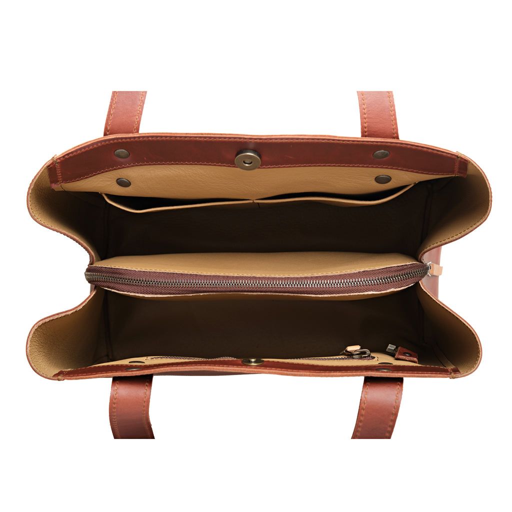 Leather Organizer Satchel in Chestnut, top-down view of the empty interior with zippered divider and key clip