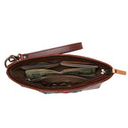 Lanita Leather Clutch in Chestnut, top-down view of unzipped interior holding cash and coins