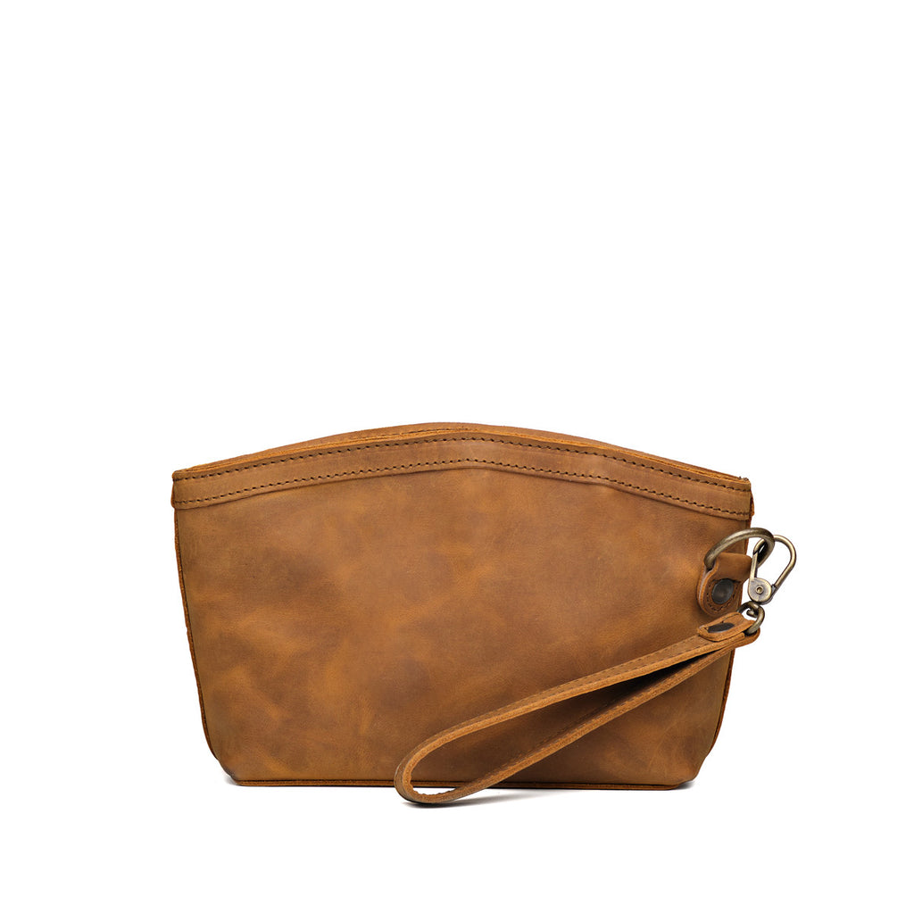 Lanita Leather Clutch in Tobacco, plain back view with wrist strap