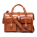 Blackstone Barrister Briefcase in English Tan, front view with two buckled pockets and shoulder strap
