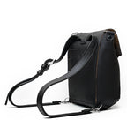 10" Convertible Crossbody in Black, angled back view with straps set up as a backpack