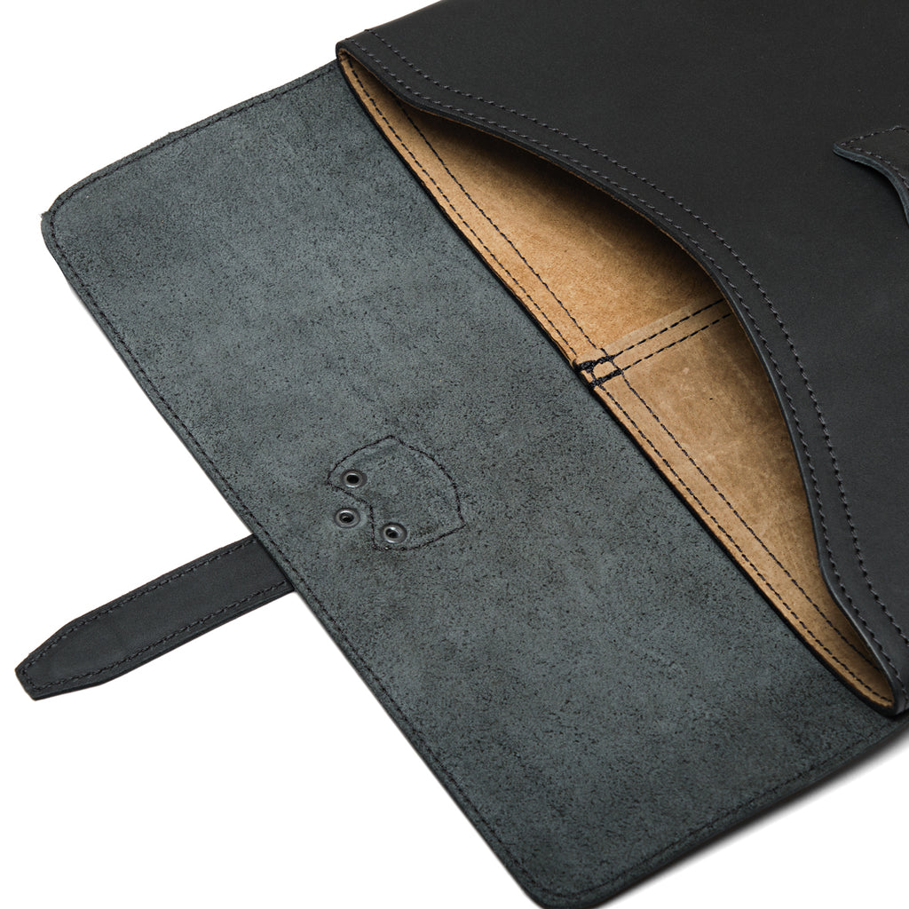 16" Document Holder in Black with the flap open, close-up of the rough-out underside and tan interior