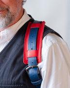 Saddleback Club Membership Paul Revere Leather Messenger Bag Backpack in Red, White and Blue, close-up of shoulder strap pad worn