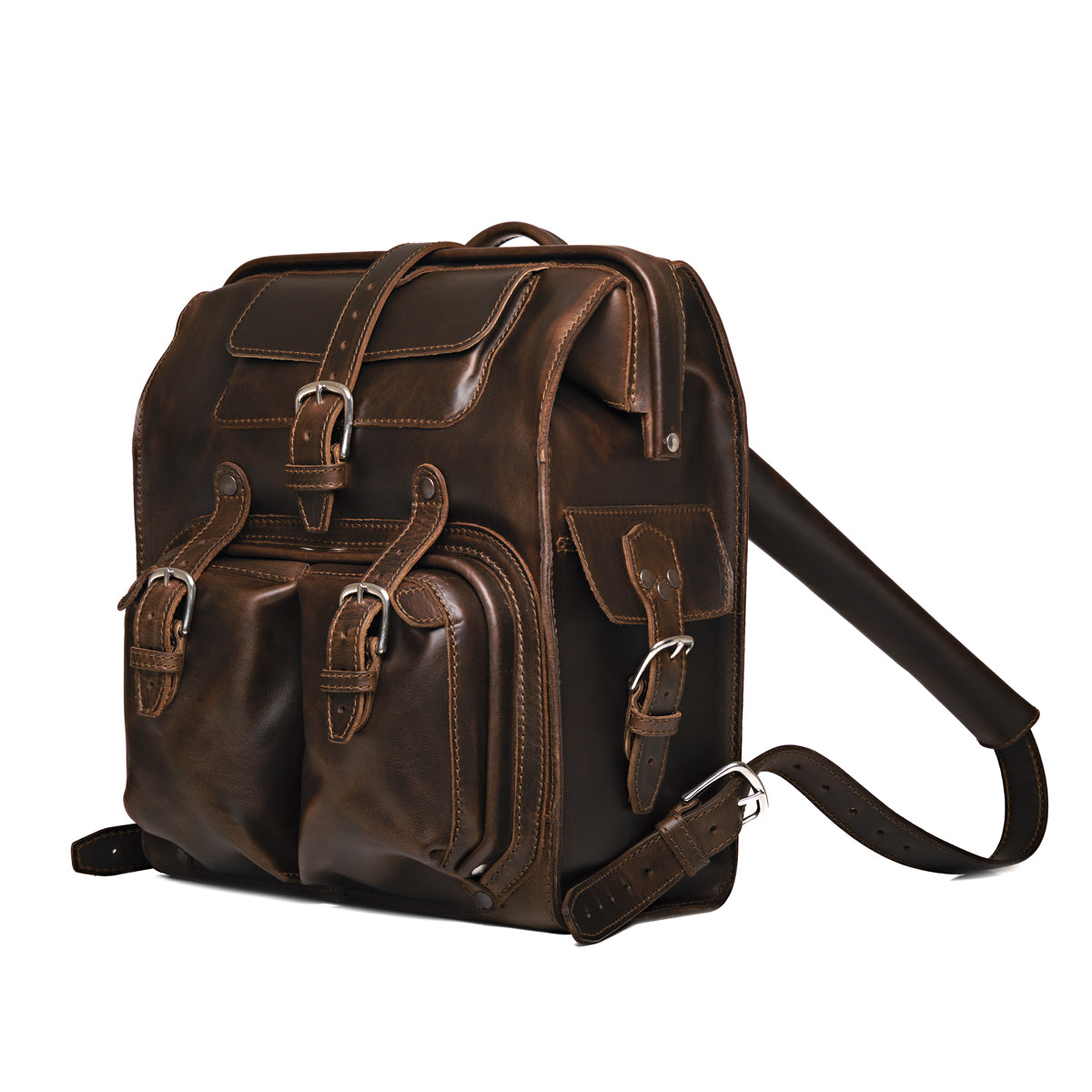 Big Mouth Leather Backpack in Dark Coffee Brown, angled front view with buckled pockets and shoulder strap