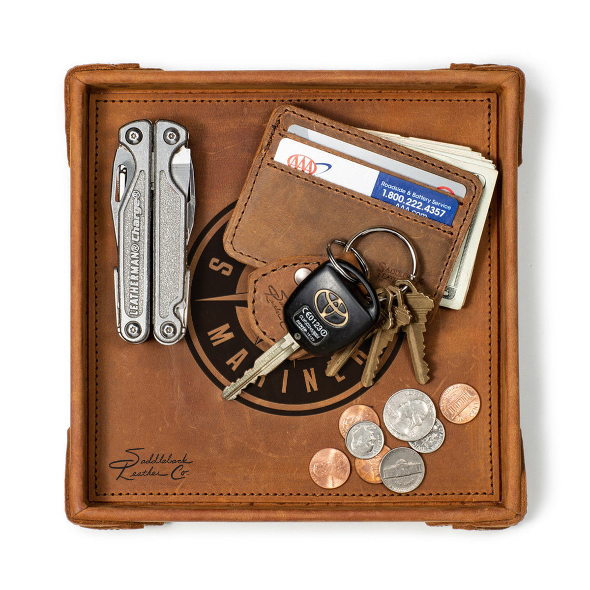 Seattle Mariners Leather Valet Tray in Tobacco, top-down view holding a multi-tool, card wallet, keys and coins