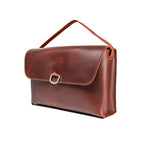 Large Leather Organizer Bag in Chestnut, angled view with tie looped up as a carry handle and metal ring on the flap