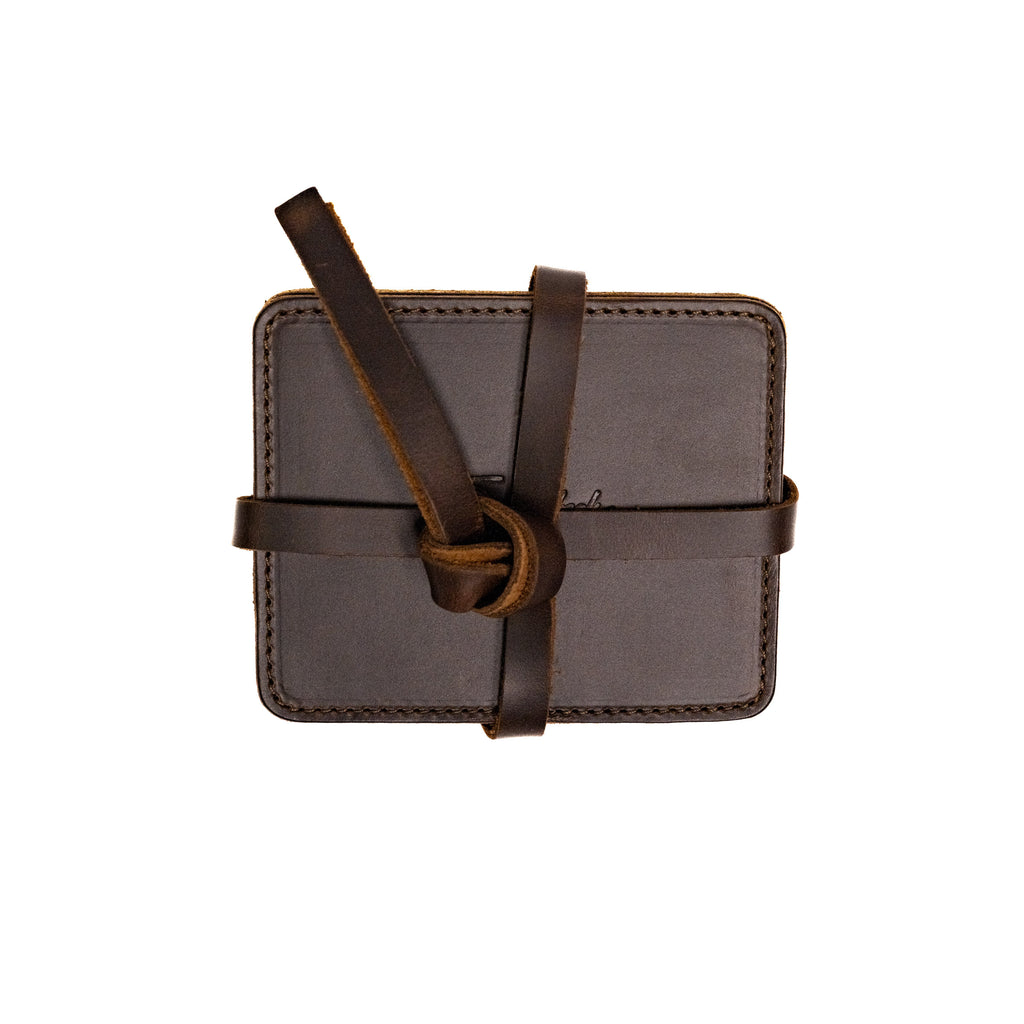 Leather Coaster Set in Dark Coffee Brown, stacked coasters wrapped and knotted with a leather tie