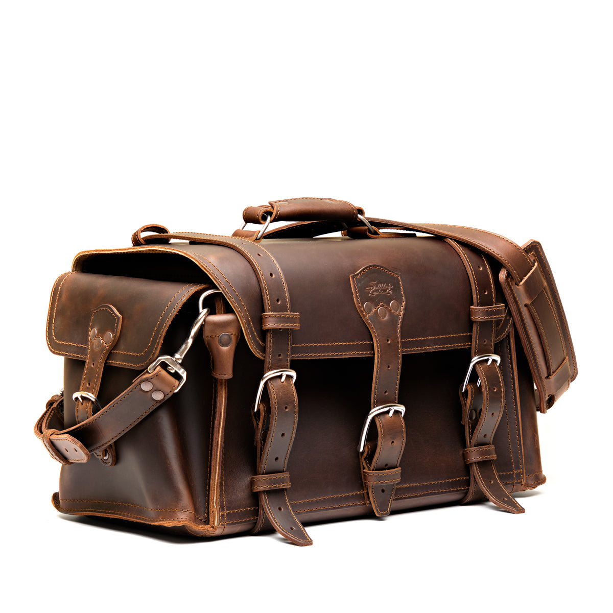 Side Pocket Leather Duffle in Dark Coffee Brown, angled front view with buckle straps, side pocket and shoulder strap