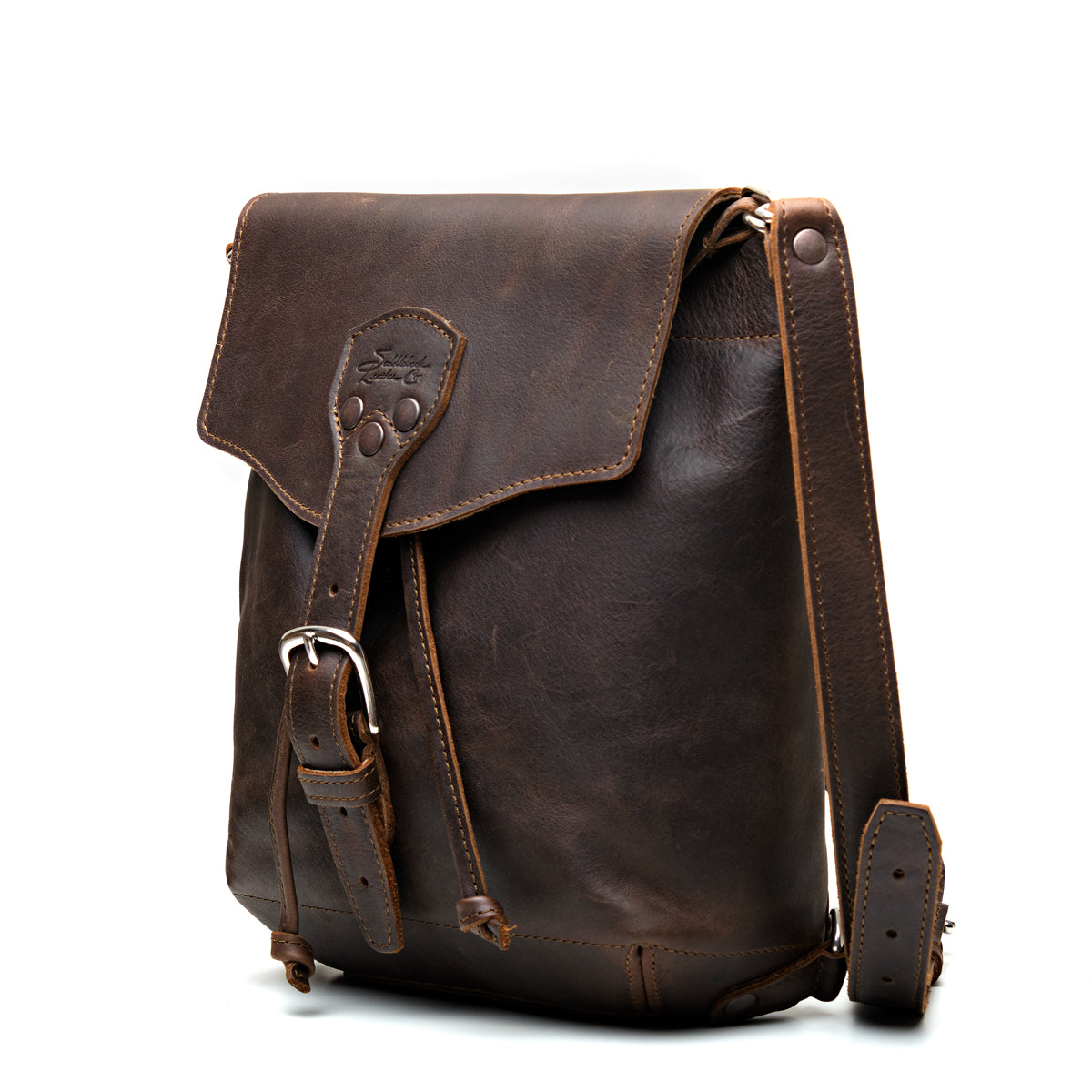 10" Convertible Crossbody in Dark Coffee Brown, angled front view with buckled flap and strap