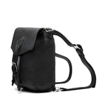 10" Convertible Crossbody in Black, angled view with buckled flap and straps set up as a backpack