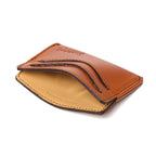 Newton Wallet in English Tan, angled side view showing the tan interior and curved card slots