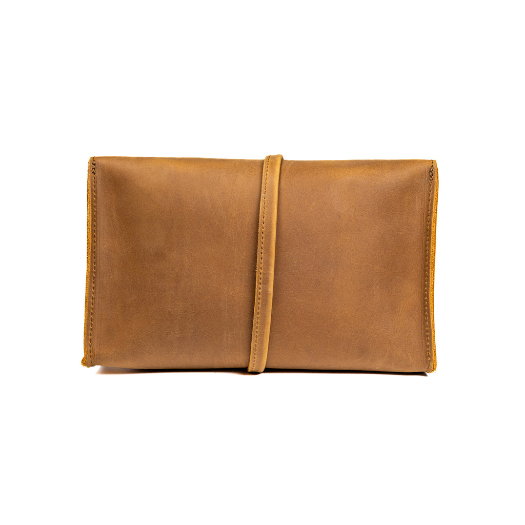 Large Leather Organizer Bag in Tobacco, back view with leather tie wrapped around