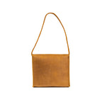 Leather Organizer Bag in Tobacco, back view hanging from its leather strap