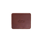 Leather Coaster Set in Chestnut, single square coaster with embossed Saddleback logo, top view